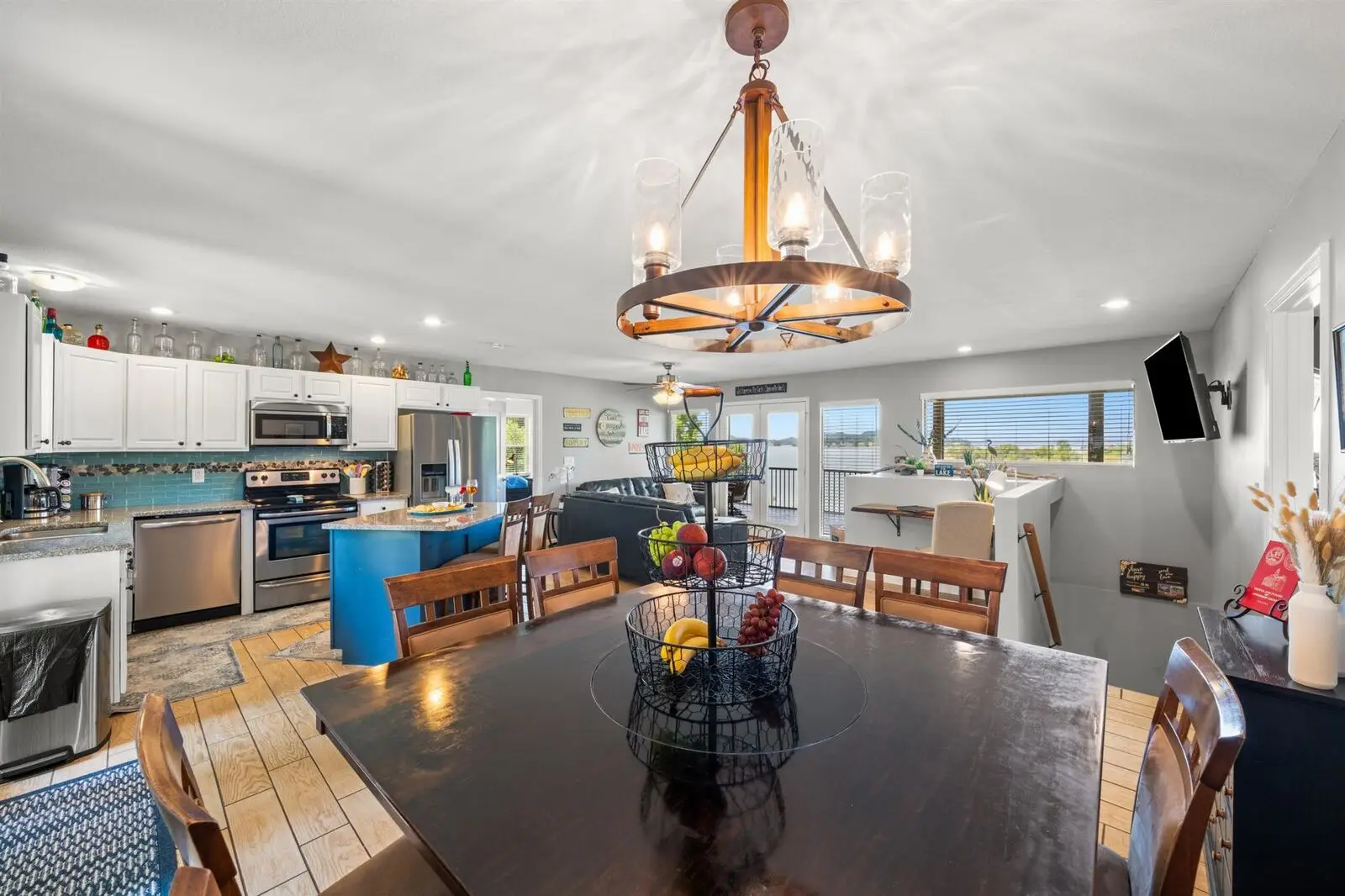 Wide view of the kitchen and dining space