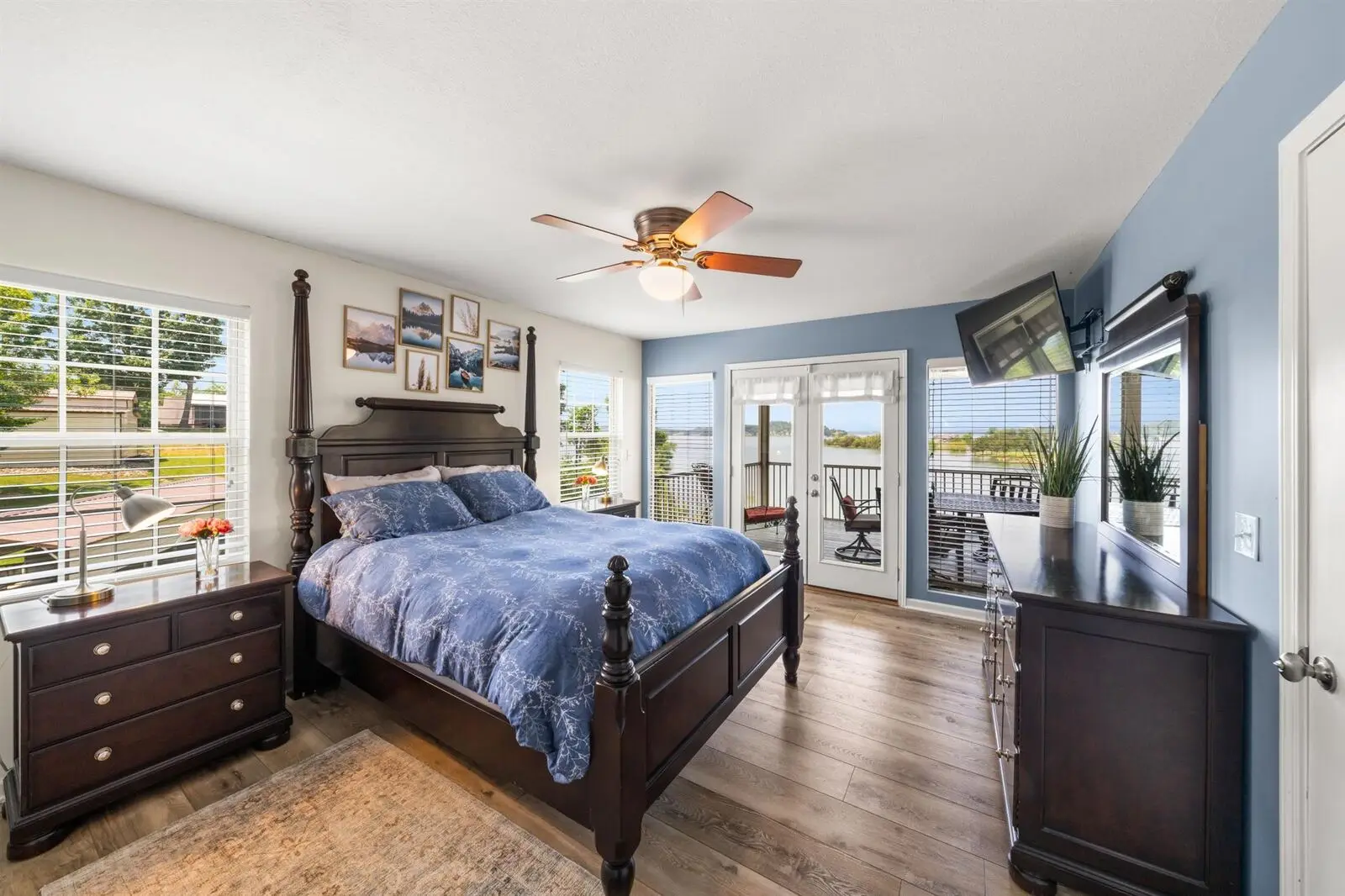 Main-level bedroom 2 with king bed and lake-view windows