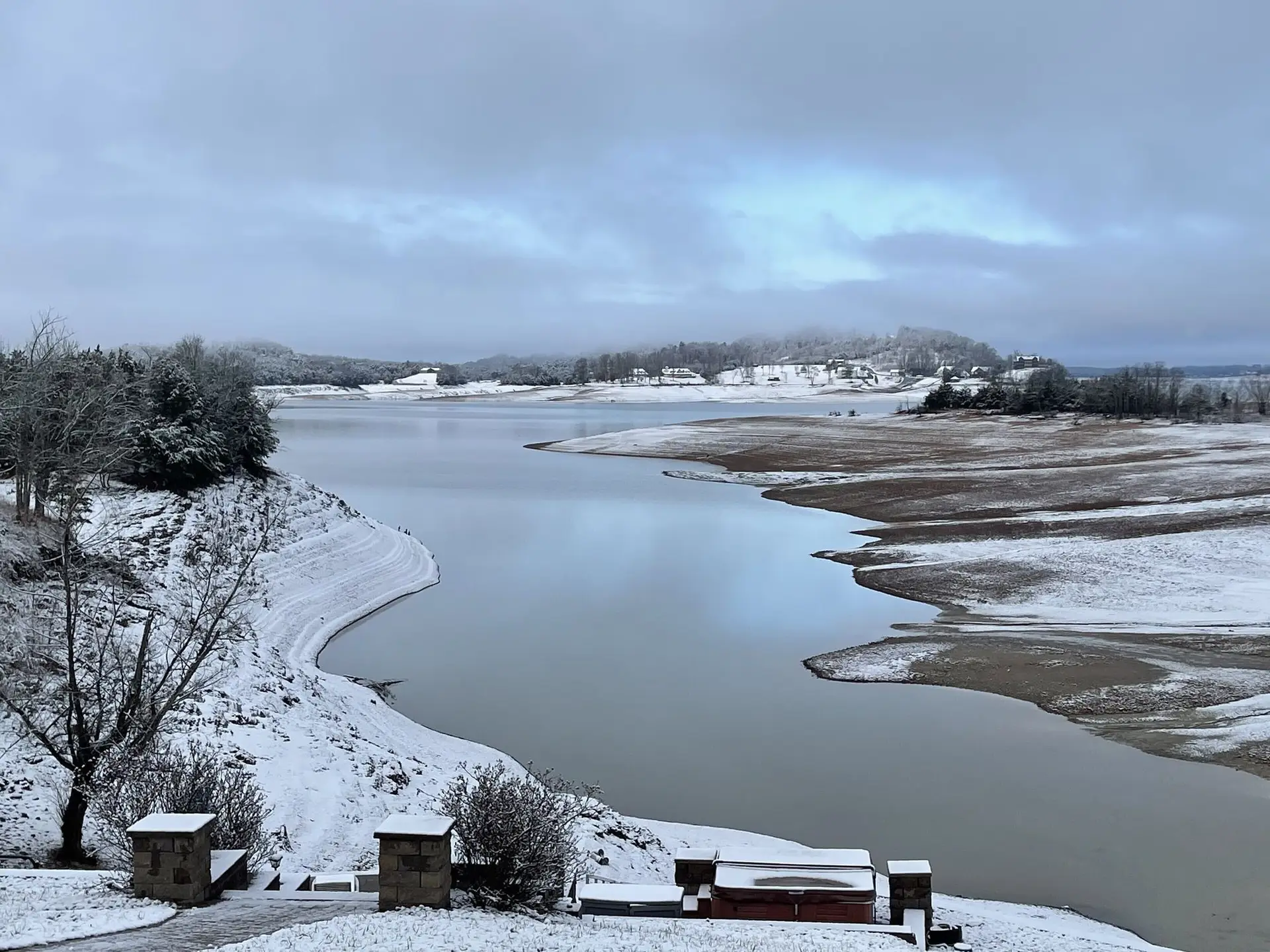 Snow covering the cove and shoreline below Fort Sunsets in winter